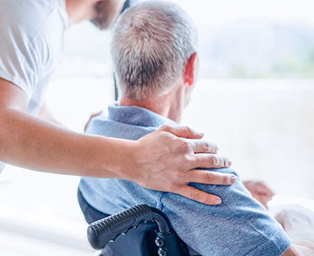 Health professional caring for a patient
